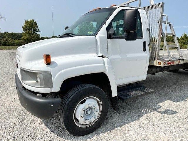GMC 5500 Tovornjaki s kesonom/platojem