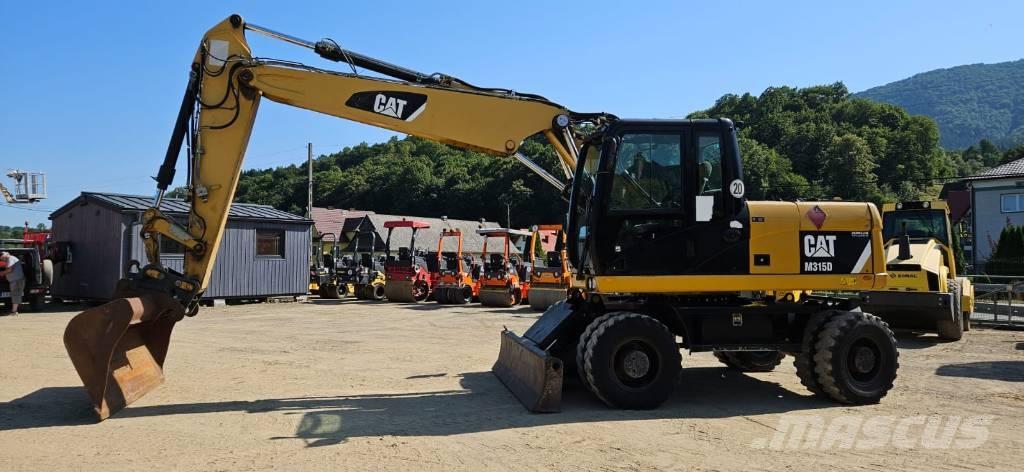 CAT M 315 D Bagri na kolesih