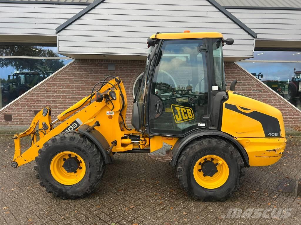 JCB 406 shovel Večnamenski nakladalci