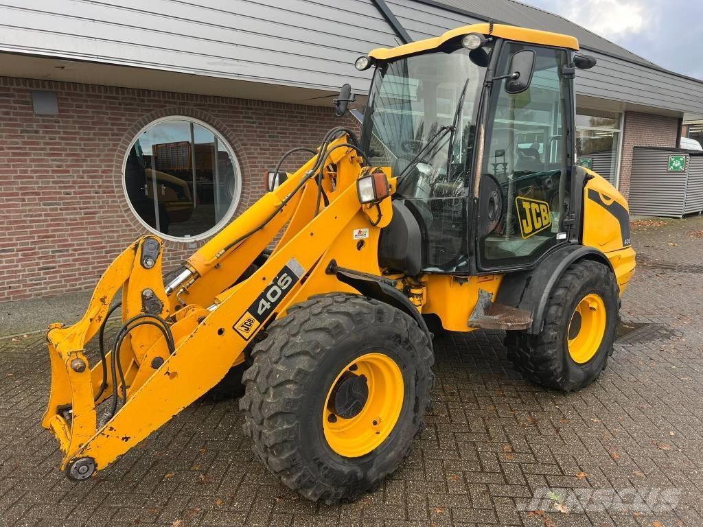 JCB 406 shovel Večnamenski nakladalci