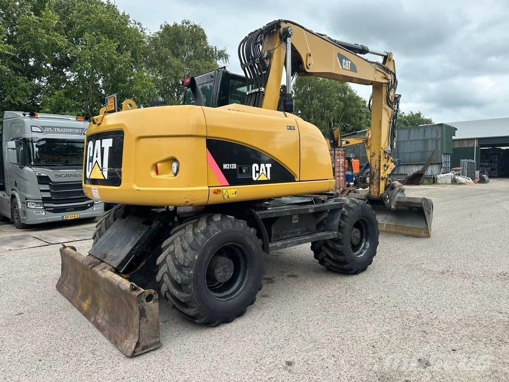 CAT M 313 D - 13.285H Bagri na kolesih