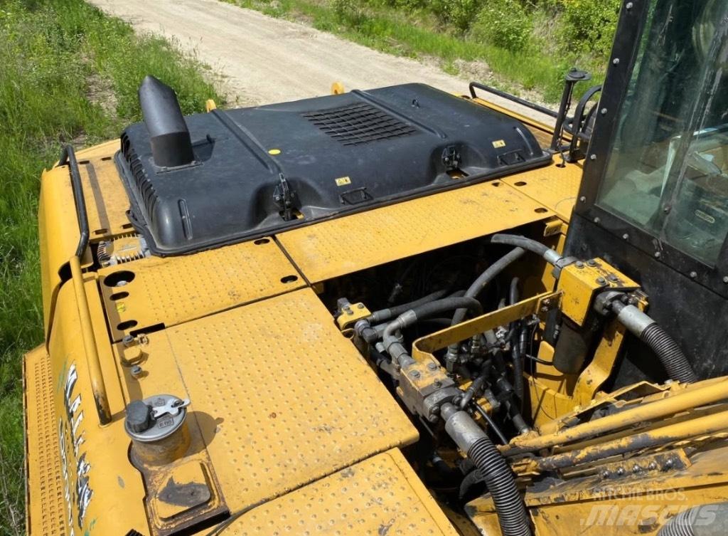 CAT 320 D FM Nakladalci za les