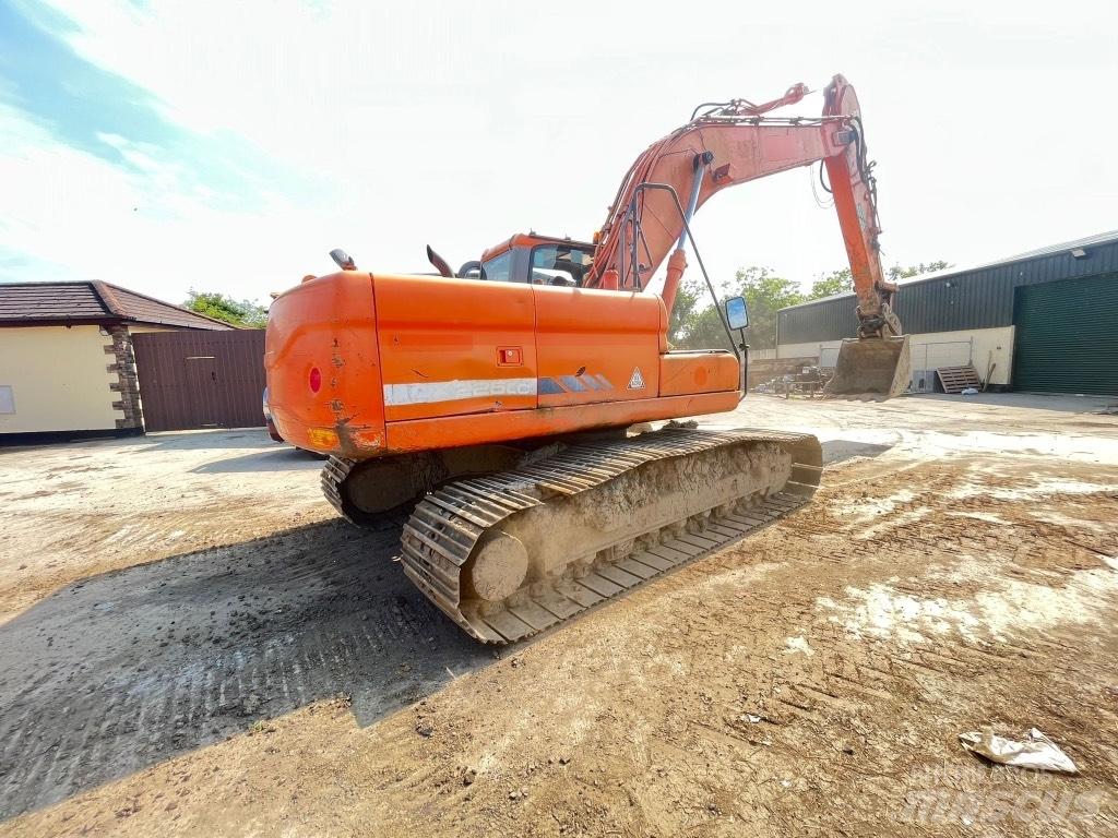 Doosan DX225 Bagri na kolesih