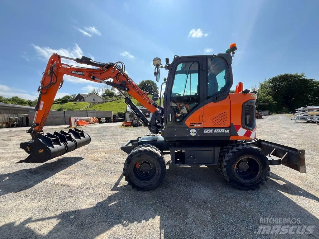Develon DX 100 W-7 Bagri na kolesih