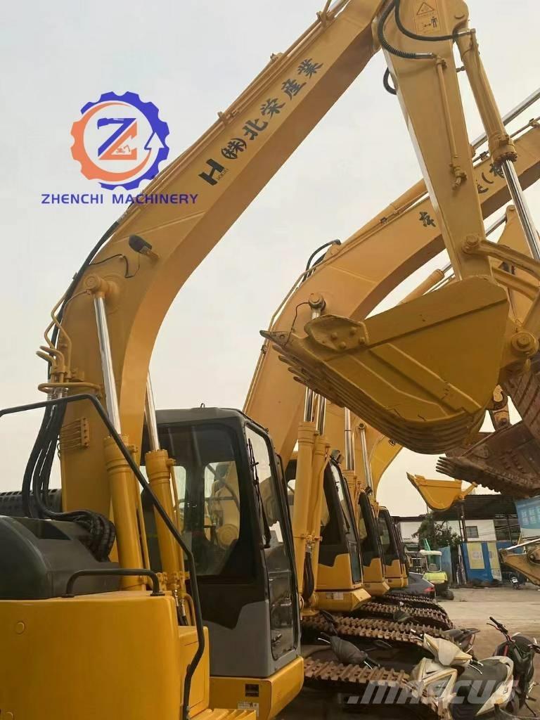 Komatsu PC 128 US Midi bagri 7t – 12t