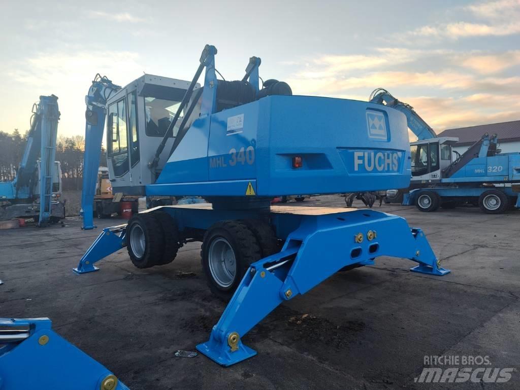 Fuchs MHL 340 C Bagri za prekladanje primarnih/sekundarnih surovin