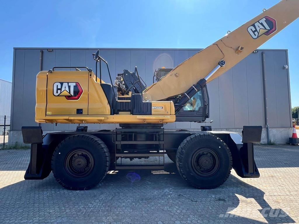 CAT MH3040 Bagri za prekladanje primarnih/sekundarnih surovin