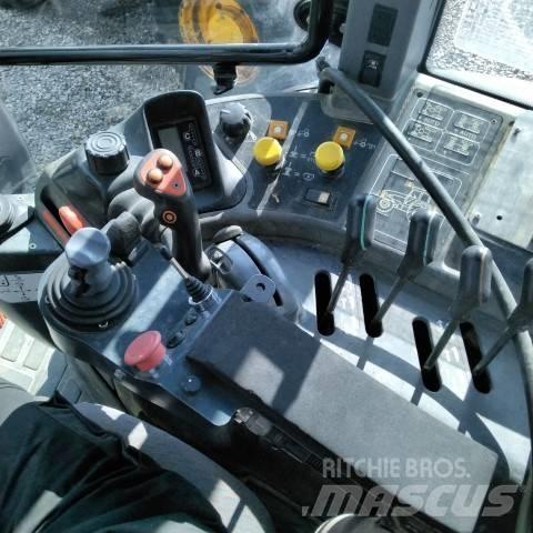New Holland TM 165 Traktorji