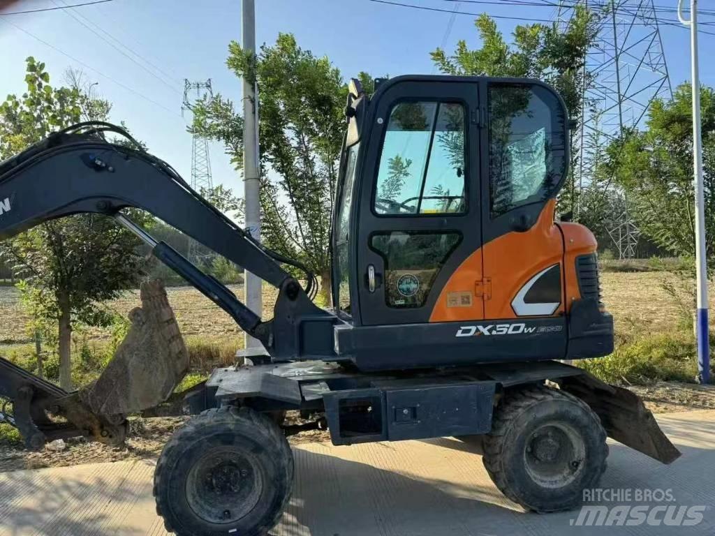 Doosan DX60W Bagri na kolesih