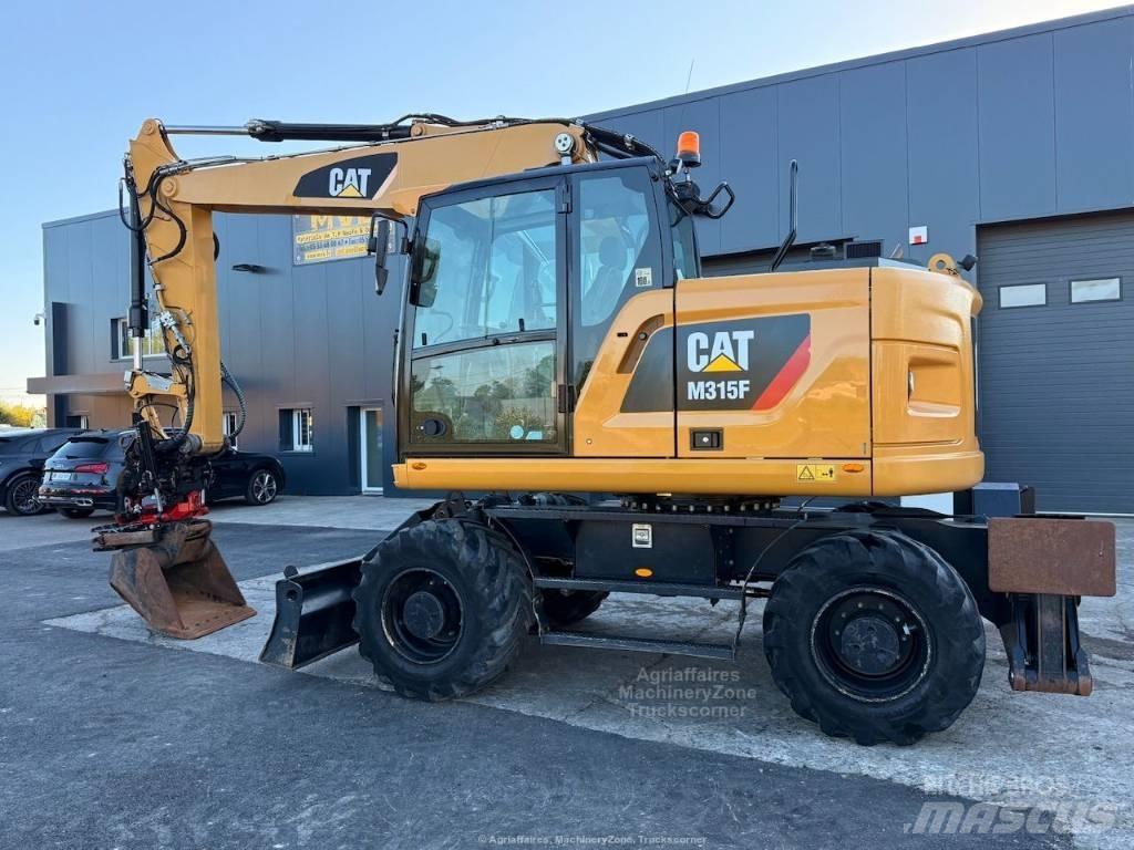 CAT M315F Bagri na kolesih