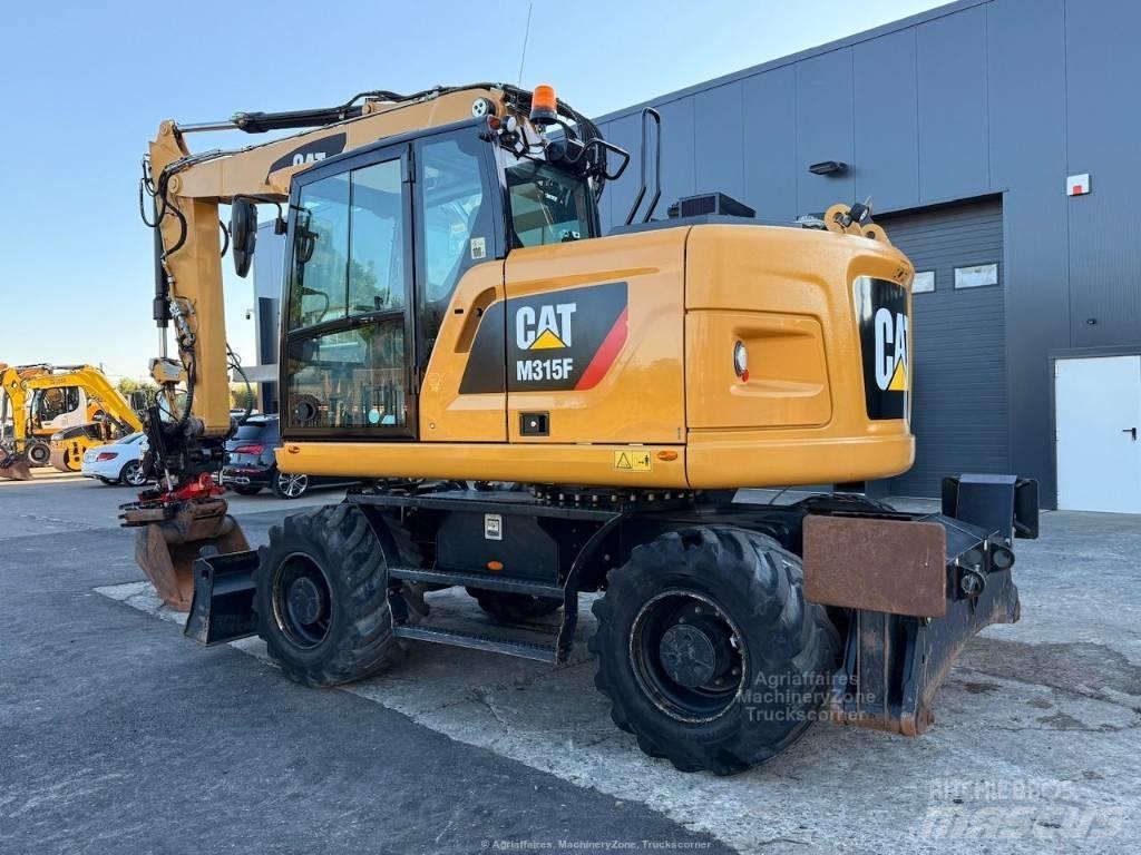 CAT M315F Bagri na kolesih