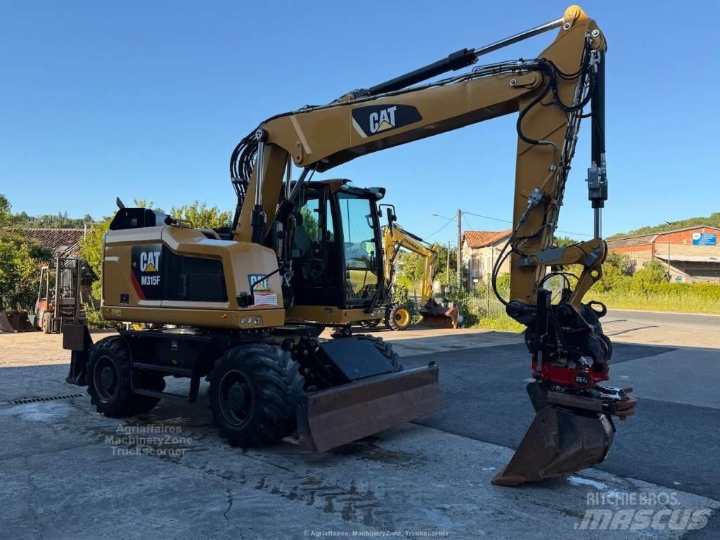 CAT M315F Bagri na kolesih