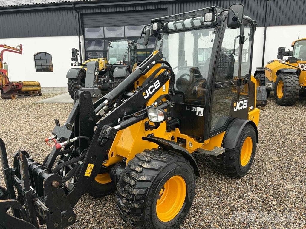 JCB 403 Kolesni nakladalci
