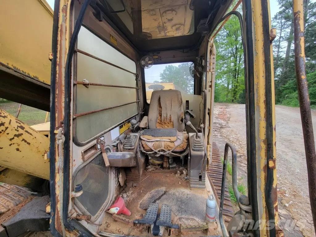 John Deere 992D Bagri goseničarji