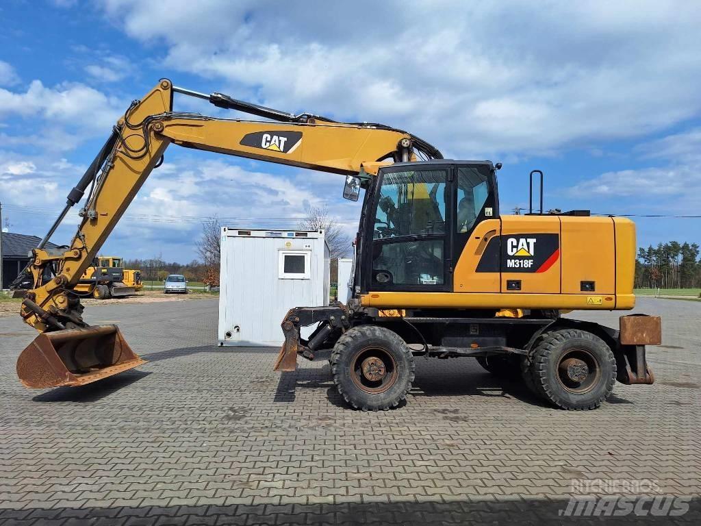 CAT M 318 F Bagri na kolesih