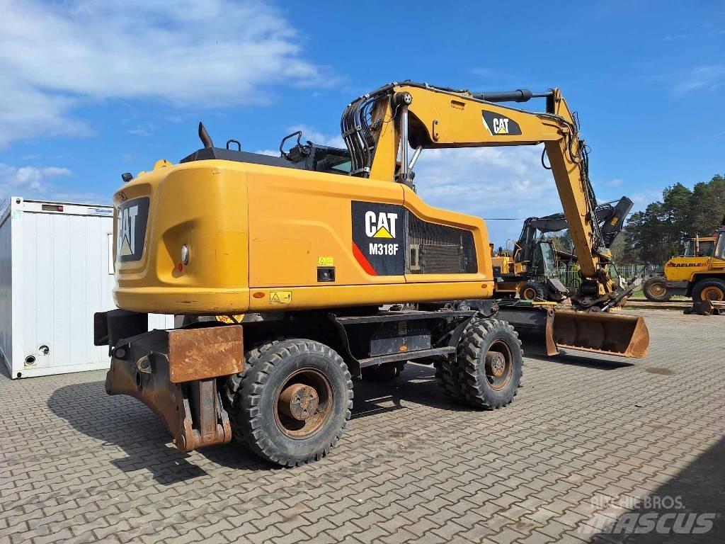 CAT M 318 F Bagri na kolesih