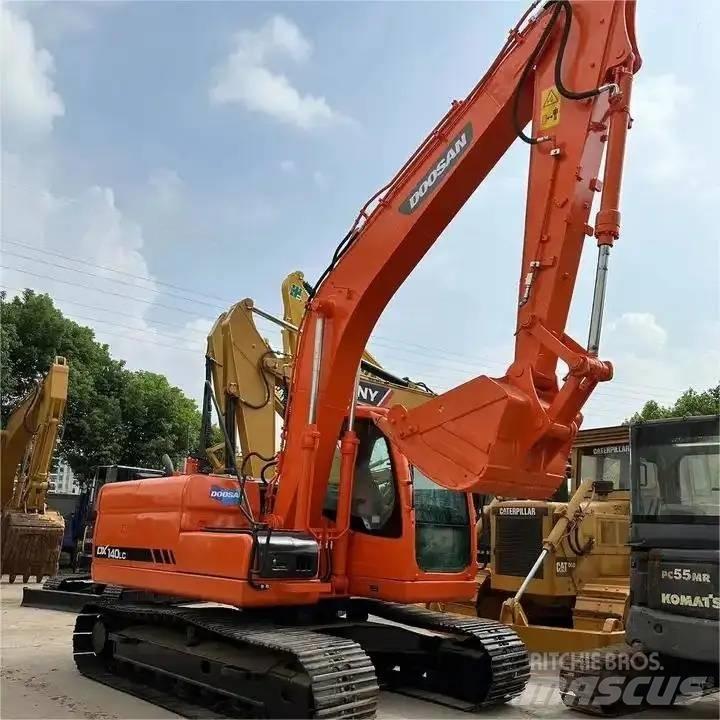 Doosan DX 140 LC Bagri goseničarji