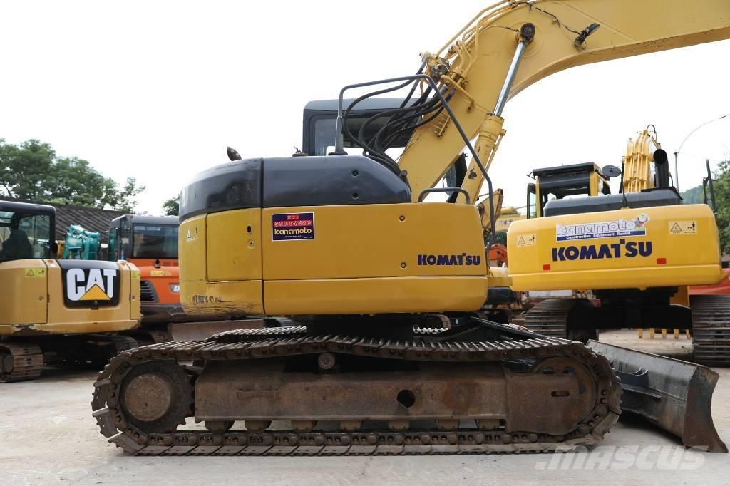 Komatsu PC 128 US Midi bagri 7t – 12t