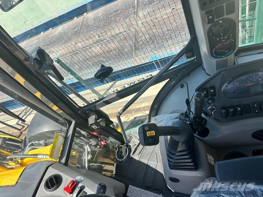 New Holland B 115 B Rovokopači