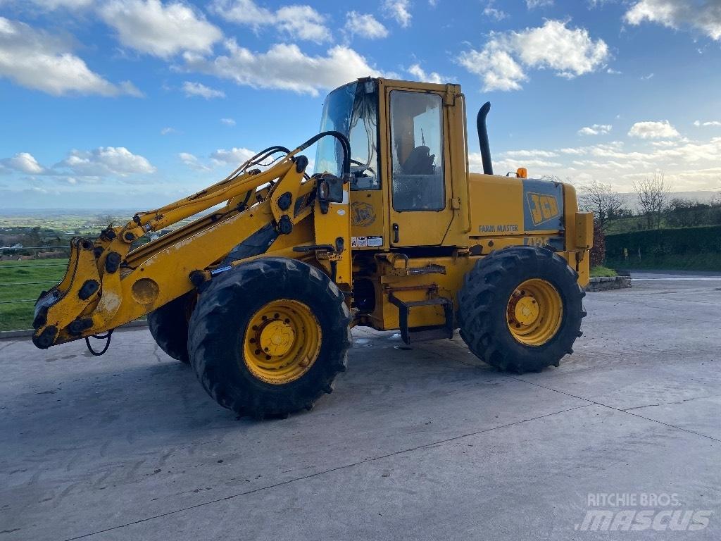 JCB 412 S Kolesni nakladalci