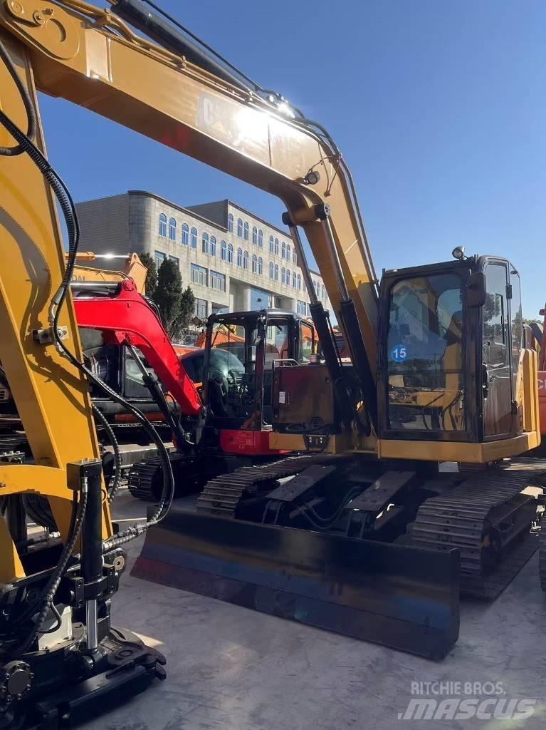 CAT 310 Bagri goseničarji