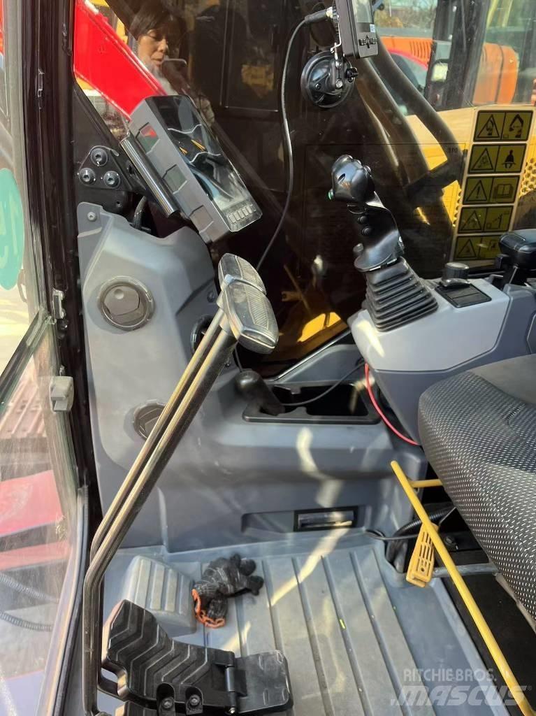 CAT 310 Bagri goseničarji