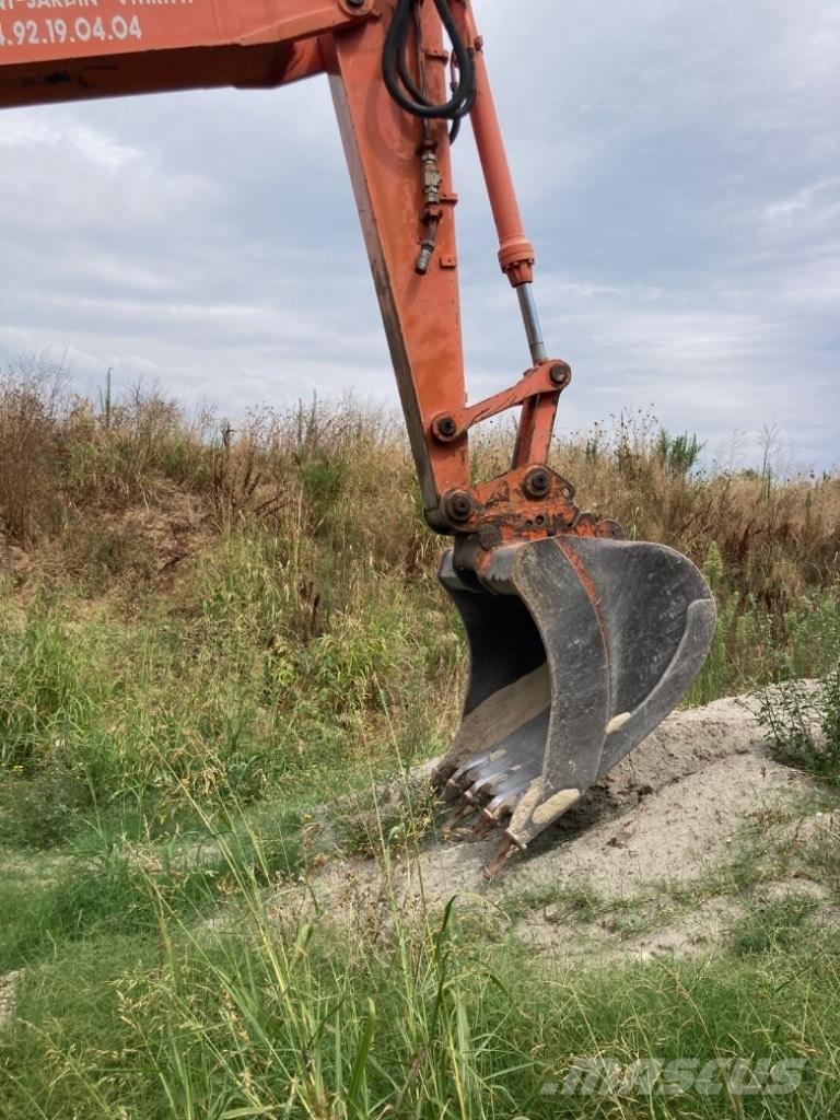 Hitachi EX 135 W Bagri na kolesih