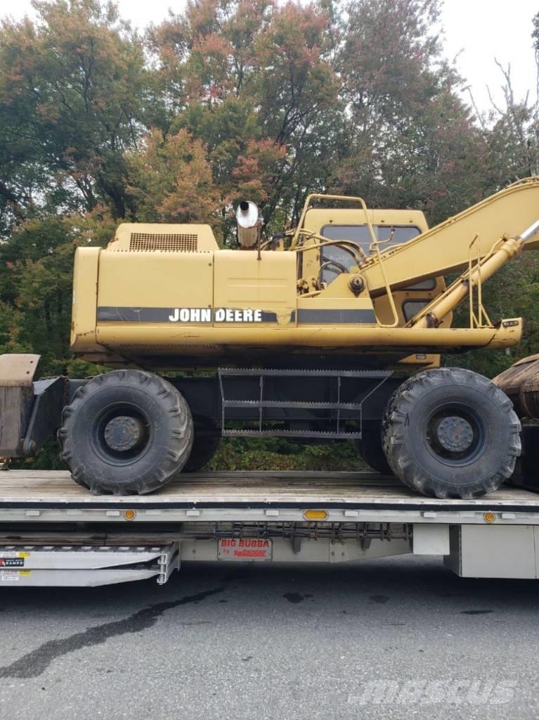 John Deere 595D Bagri na kolesih