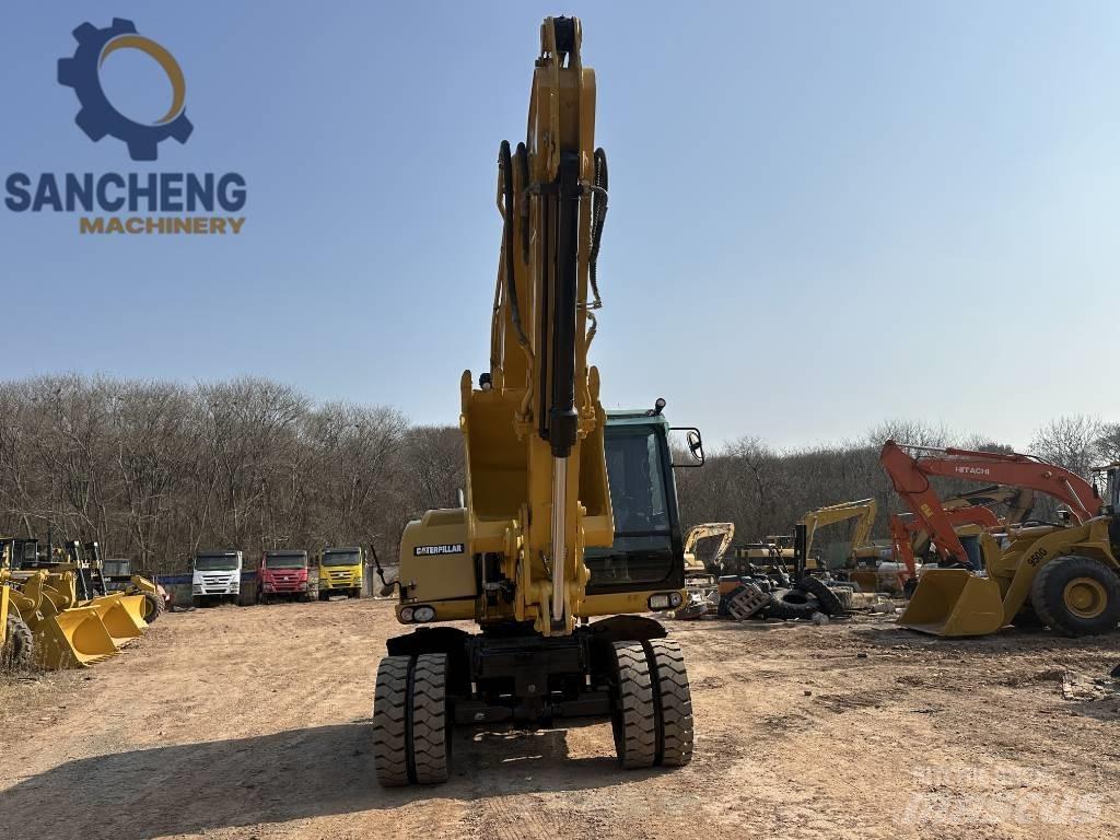 CAT M 320 D2 Bagri na kolesih