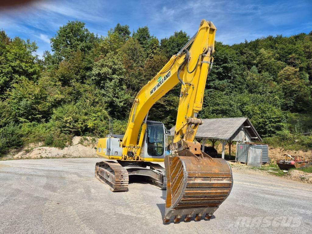 New Holland E 215 Bagri goseničarji