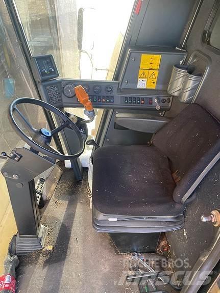 New Holland TC 56 Kombajni
