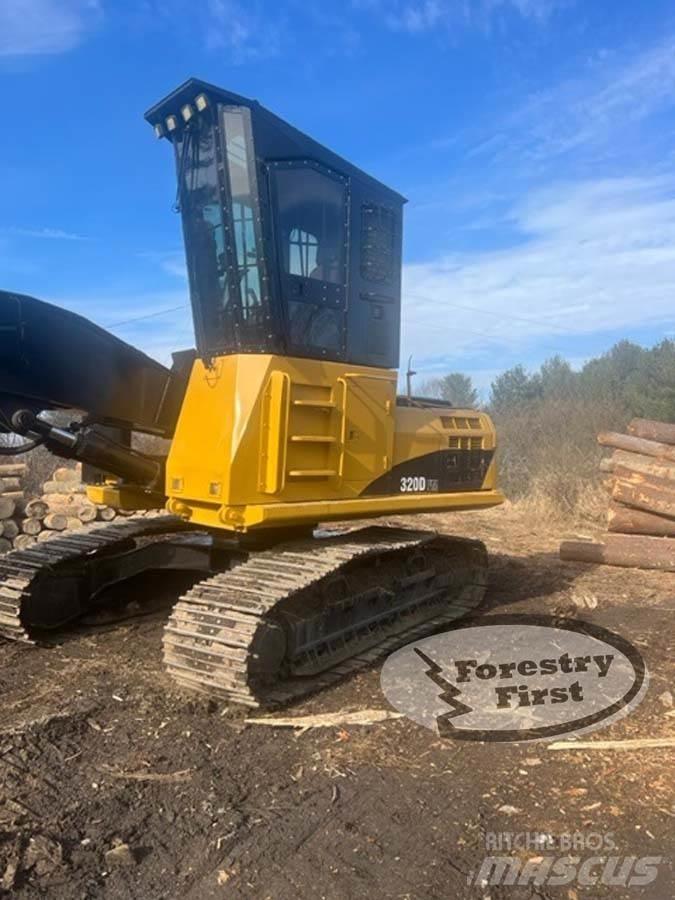 CAT 320D FM Nakladalci za les