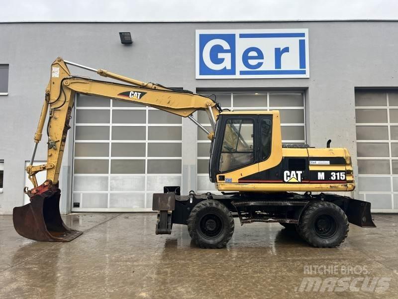 CAT M 315 Bagri na kolesih