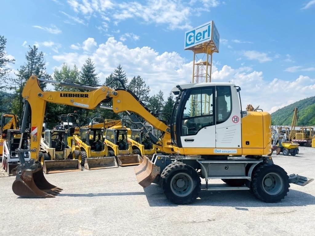 Liebherr A910 Compact Bagri na kolesih