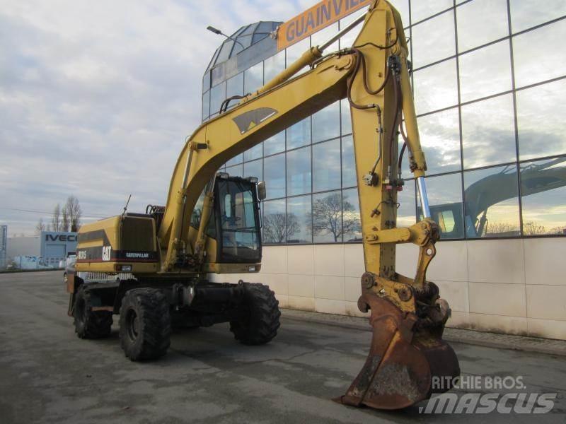 CAT M315 Bagri na kolesih