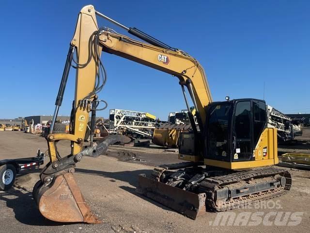 CAT 310 Bagri goseničarji