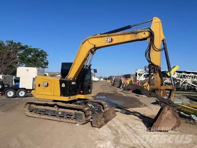 CAT 310 Bagri goseničarji