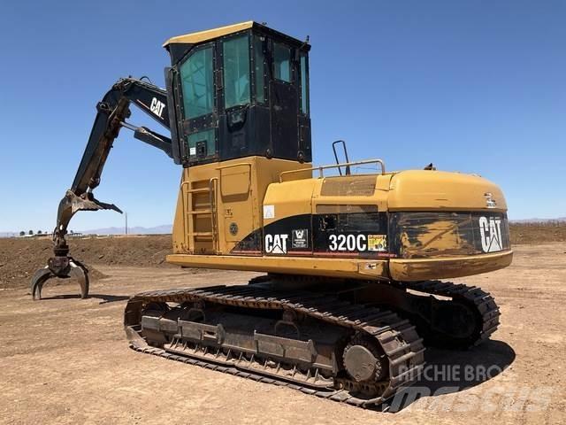 CAT 320C Nakladalci za les