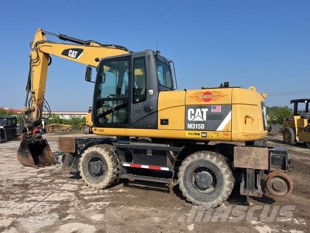 CAT M315D Bagri na kolesih