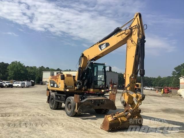 CAT M318D Bagri na kolesih