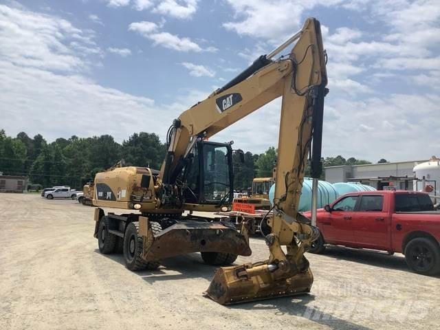 CAT M318D Bagri na kolesih