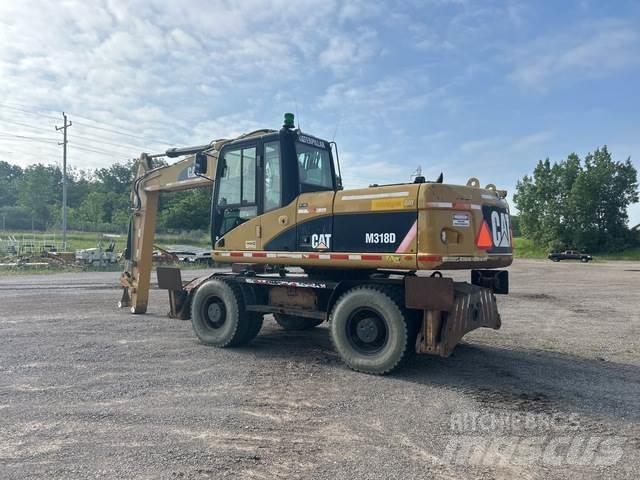 CAT M318D Bagri na kolesih