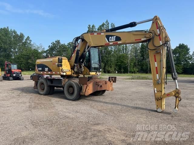 CAT M318D Bagri na kolesih