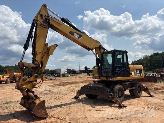 CAT M318D Bagri na kolesih