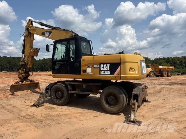 CAT M318D Bagri na kolesih