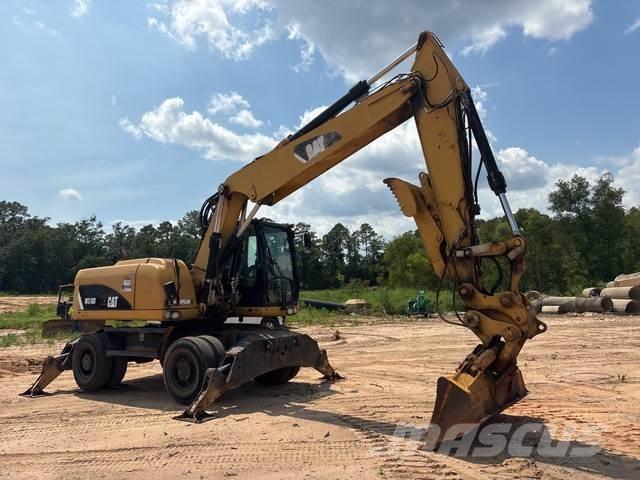 CAT M318D Bagri na kolesih