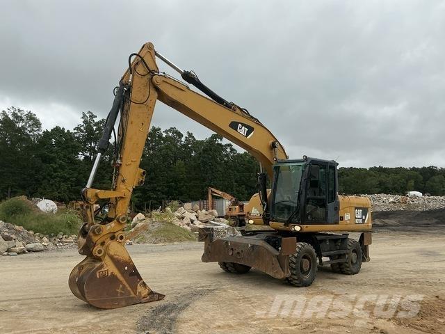 CAT M318D Bagri na kolesih