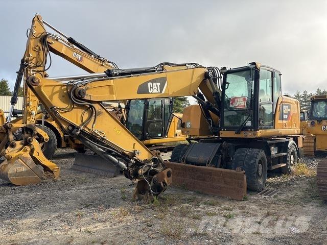 CAT M318F Bagri na kolesih