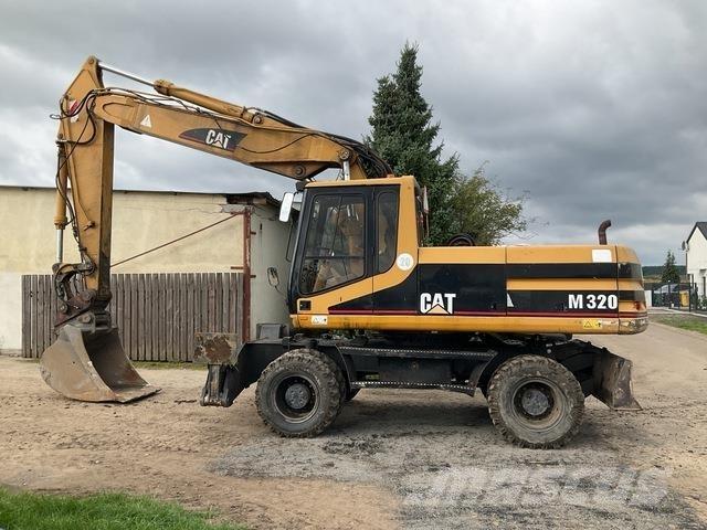 CAT M320 Bagri na kolesih