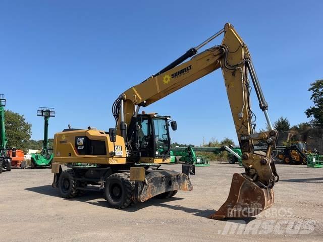 CAT M322F Bagri na kolesih
